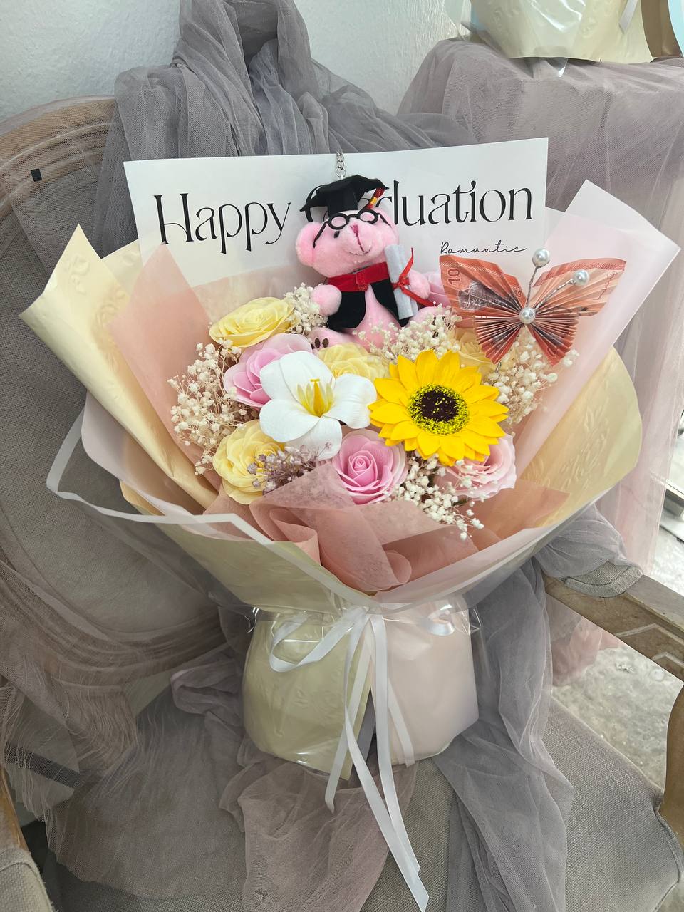 Graduation bouquet for New Era University College, Kajang delivery